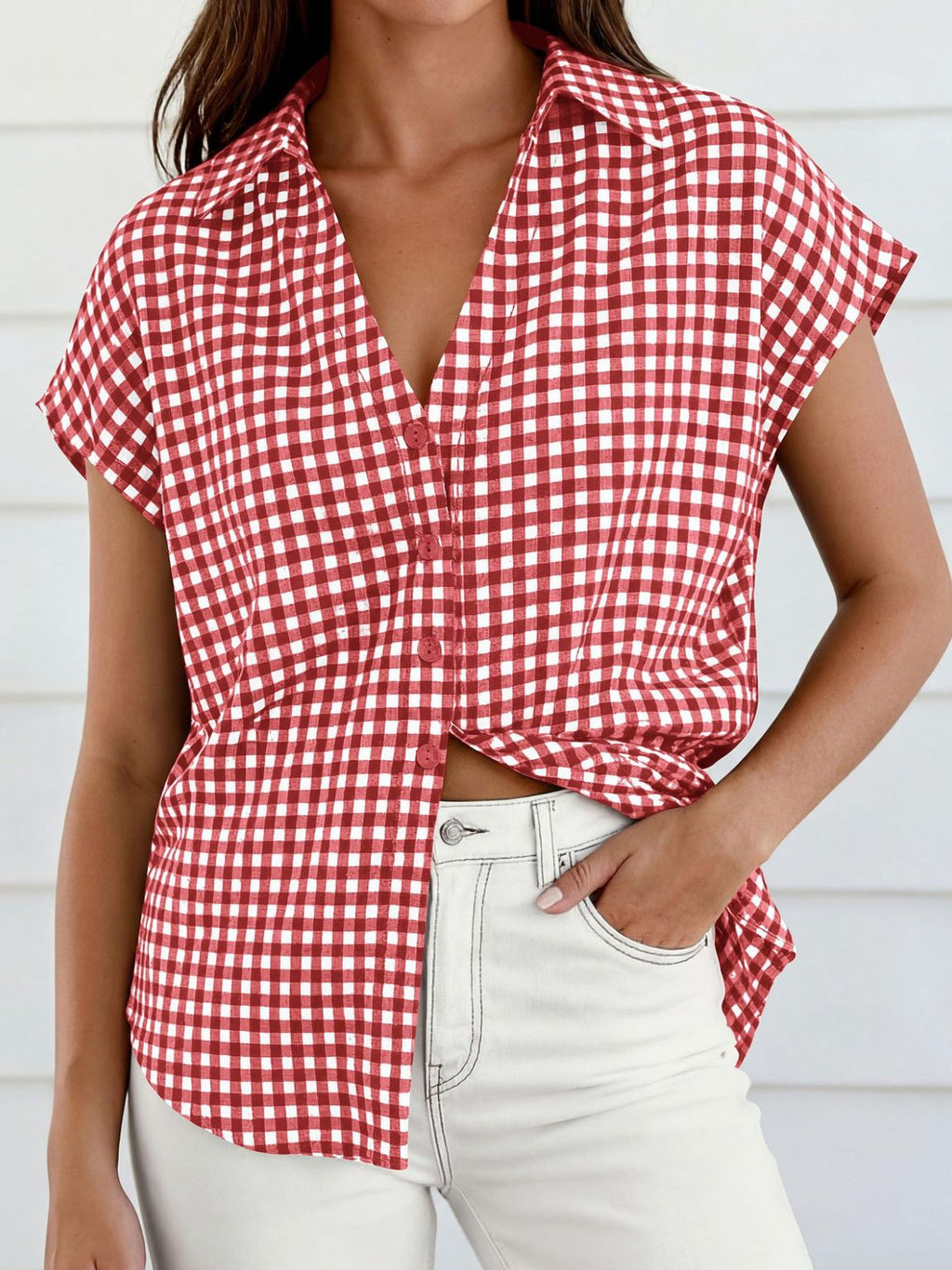 Women's gingham print button-down shirt with tie detail from Trendsi, featuring a classic pattern and stylish collar.