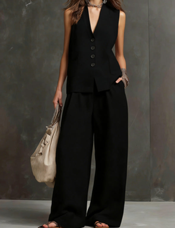 Women’s linen sleeveless vest and wide-leg pants two-piece set by FitiqueFit, featuring lightweight, breathable fabric and relaxed fit.