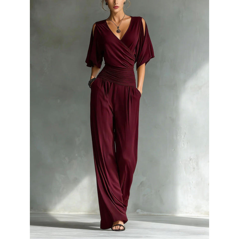 Women's slim fit V-neck jumpsuit by FitiqueFit featuring straight leg design, in a stylish and modern jumpsuits and rompers style.