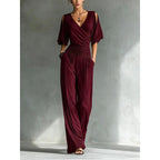 Women's slim fit V-neck jumpsuit by FitiqueFit featuring straight leg design, in a stylish and modern jumpsuits and rompers style.