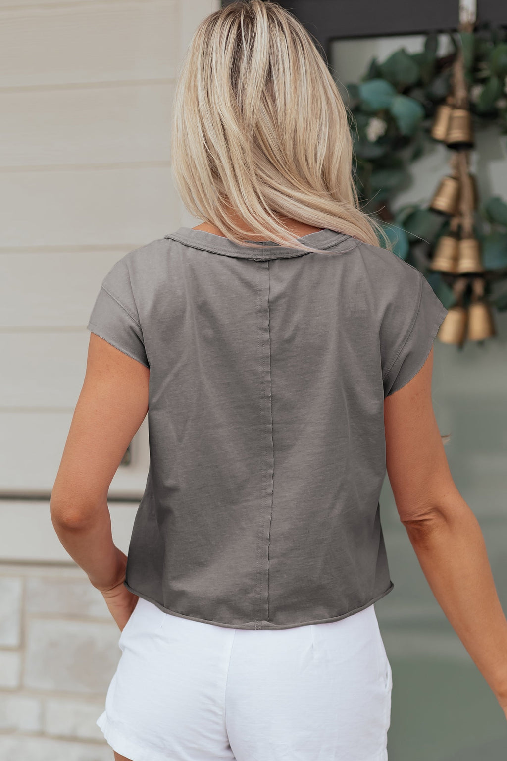 Ellianna Fit Cotton Tank Top by Threaded Pear, close-up of soft, white sleeveless tank top with fitted style and breathable fabric.