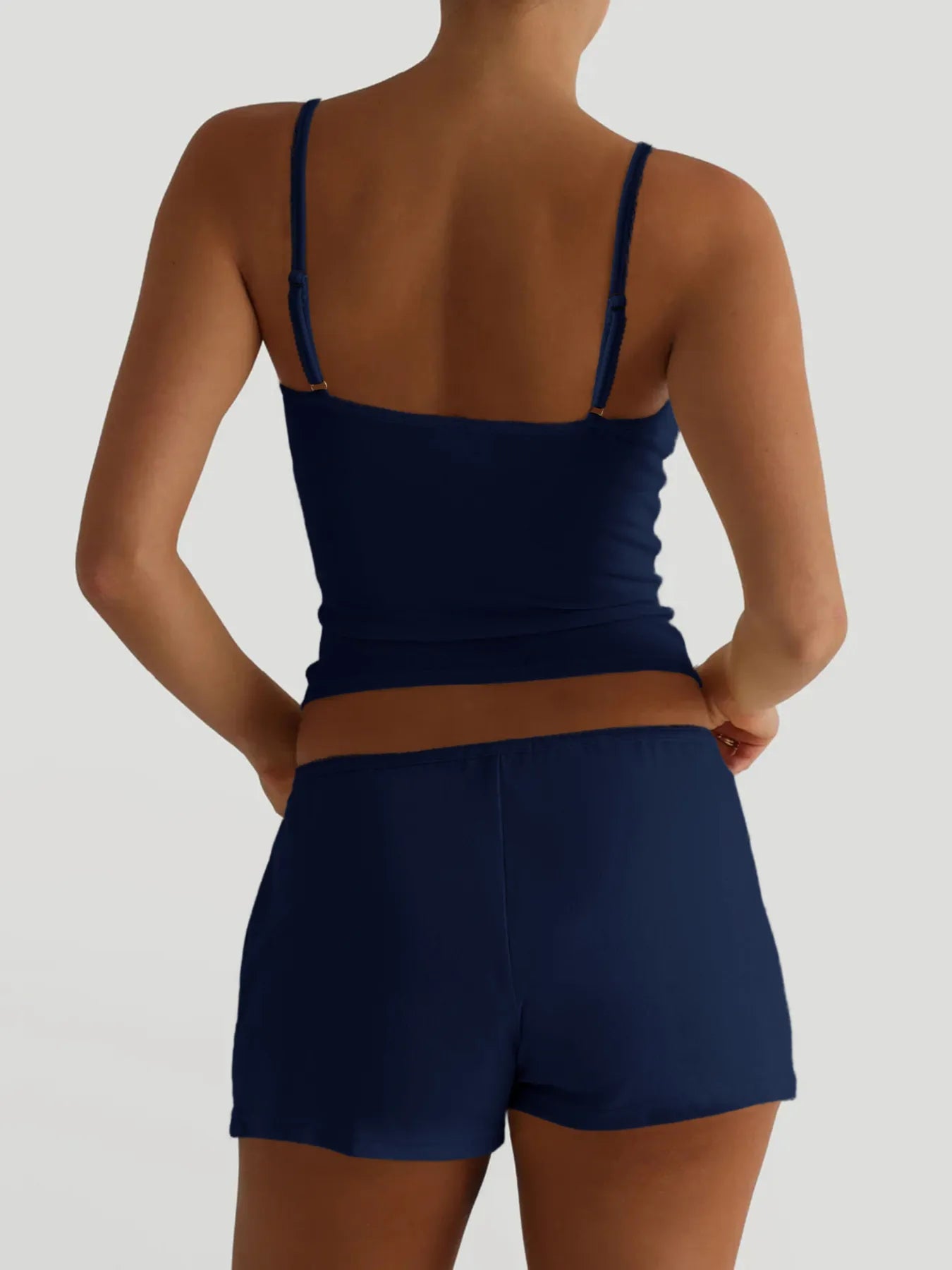 Trendsi V-neck cami and shorts active wear set in soft fabric, perfect for casual or workout wear, shown in a neutral color.