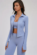 Fitglutes activewear 3-piece set including a zip jacket, cross-back sports bra, and matching leggings for workout and gym wear.