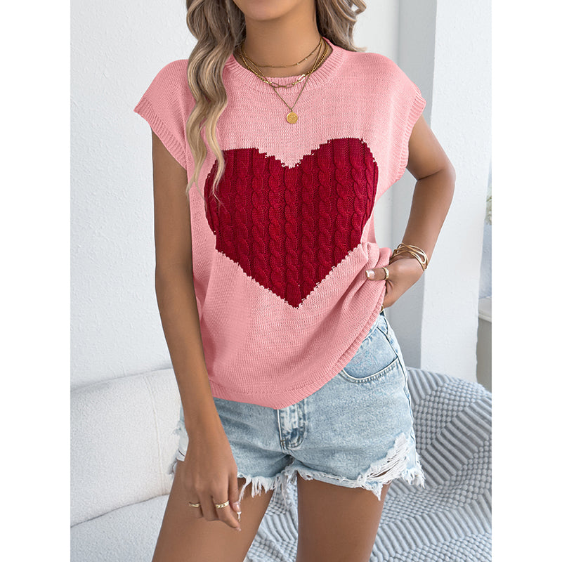 Women’s heart color block knit top by Plush Fashion Hub, casual sleeveless Valentine tank in vibrant pink and red knit fabric.