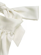 Plush Fashion Hub satin halter neck tank top, sleeveless with a smooth, shiny fabric, designed for stylish summer wear.