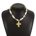 Pearl and cross pendant necklace by Shopimist, featuring a delicate pearl and silver cross charm on a fine chain.