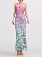 Floral embroidered tube maxi dress by Shopimist featuring vibrant flower patterns and a fitted, floor-length design.