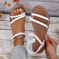 Open toe flats sandals by Shopimist with minimalist design, featuring slim straps and comfortable flat sole.