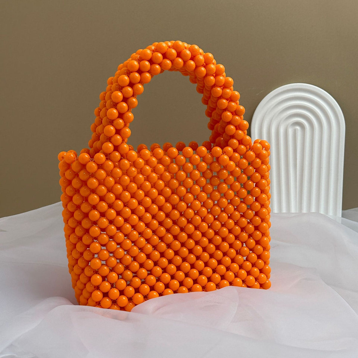 Eprolo beaded handbag with solid color design and intricate beadwork, stylish accessory for fashionable outfits.