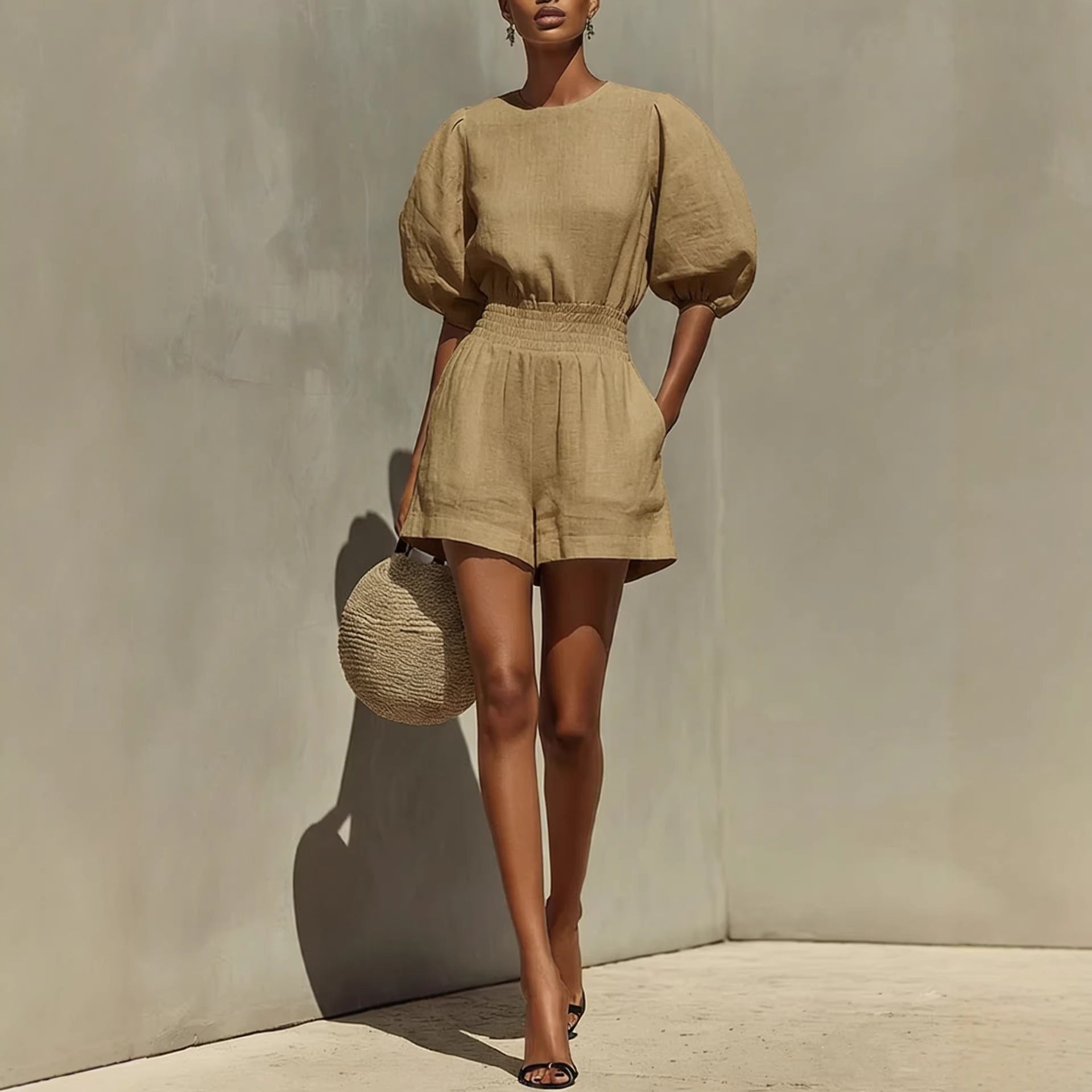 Women's puff-sleeve top and cropped shorts set by FitiqueFit, casual chic casualwear, shown on a model.