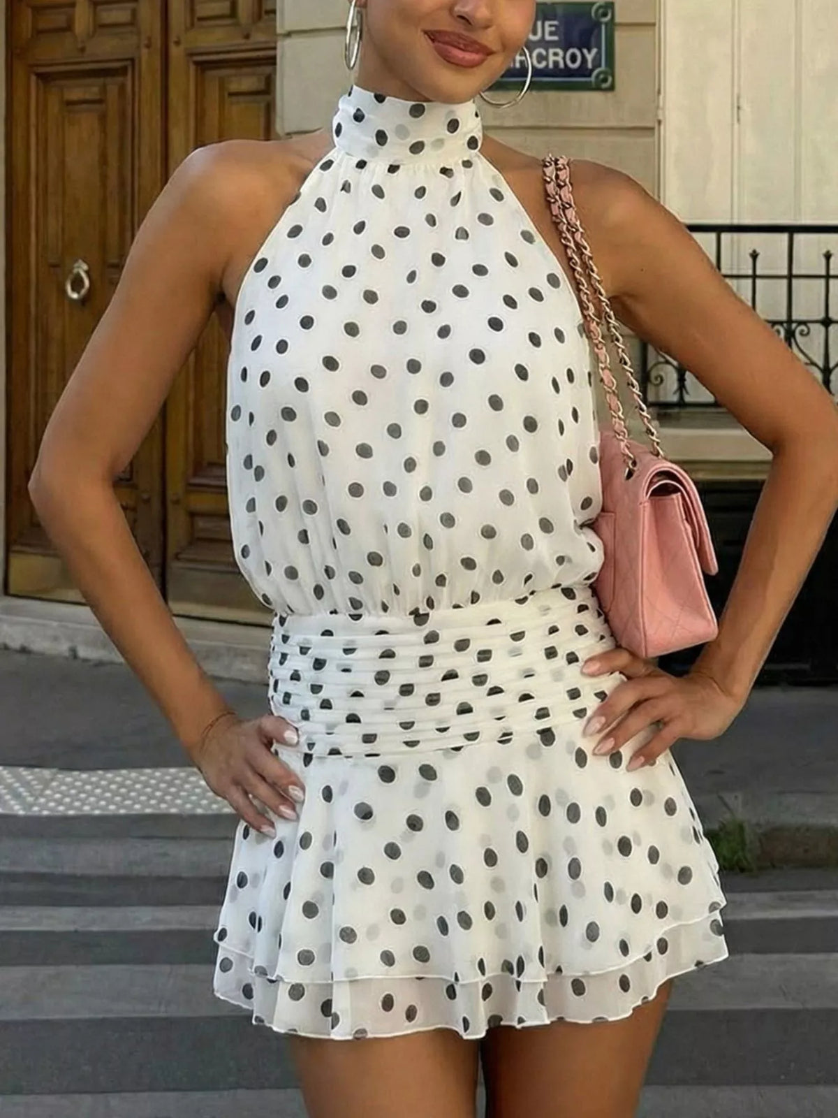 Polka dot halter neck ruffle dress by Plush Fashion Hub, featuring a fitted bodice and flouncy ruffle hem, perfect for summer wear.