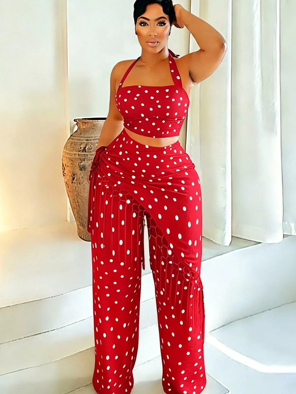 Polka dot halter neck cami top and fringe trim pants set featuring rings from Trendsi, displayed on a stylish model.