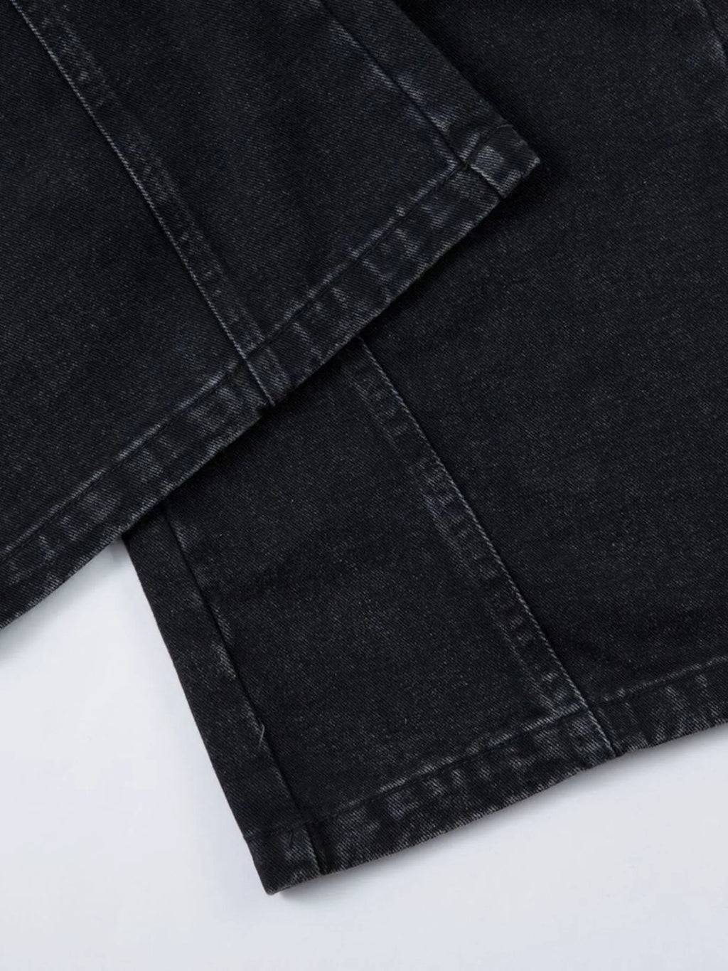 Men's wide-leg denim jeans by Plush Fashion Shop, showing the relaxed fit and classic denim texture.