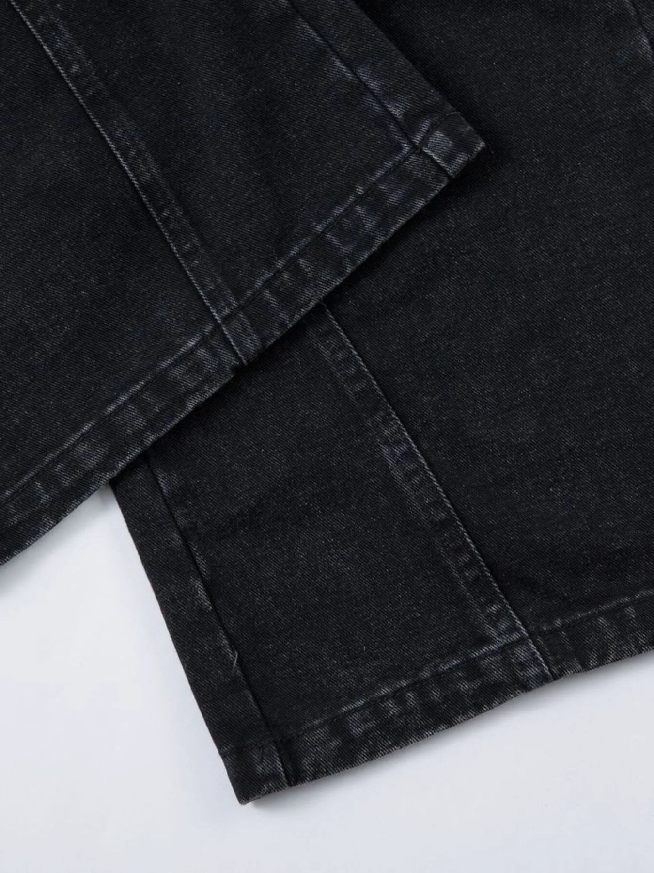 Men's wide-leg denim jeans by Plush Fashion Shop, showing the relaxed fit and classic denim texture.