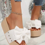 Women's chic bow decor platform sandals by Trendsi, featuring comfortable flat walking shoes with stylish bow accents.