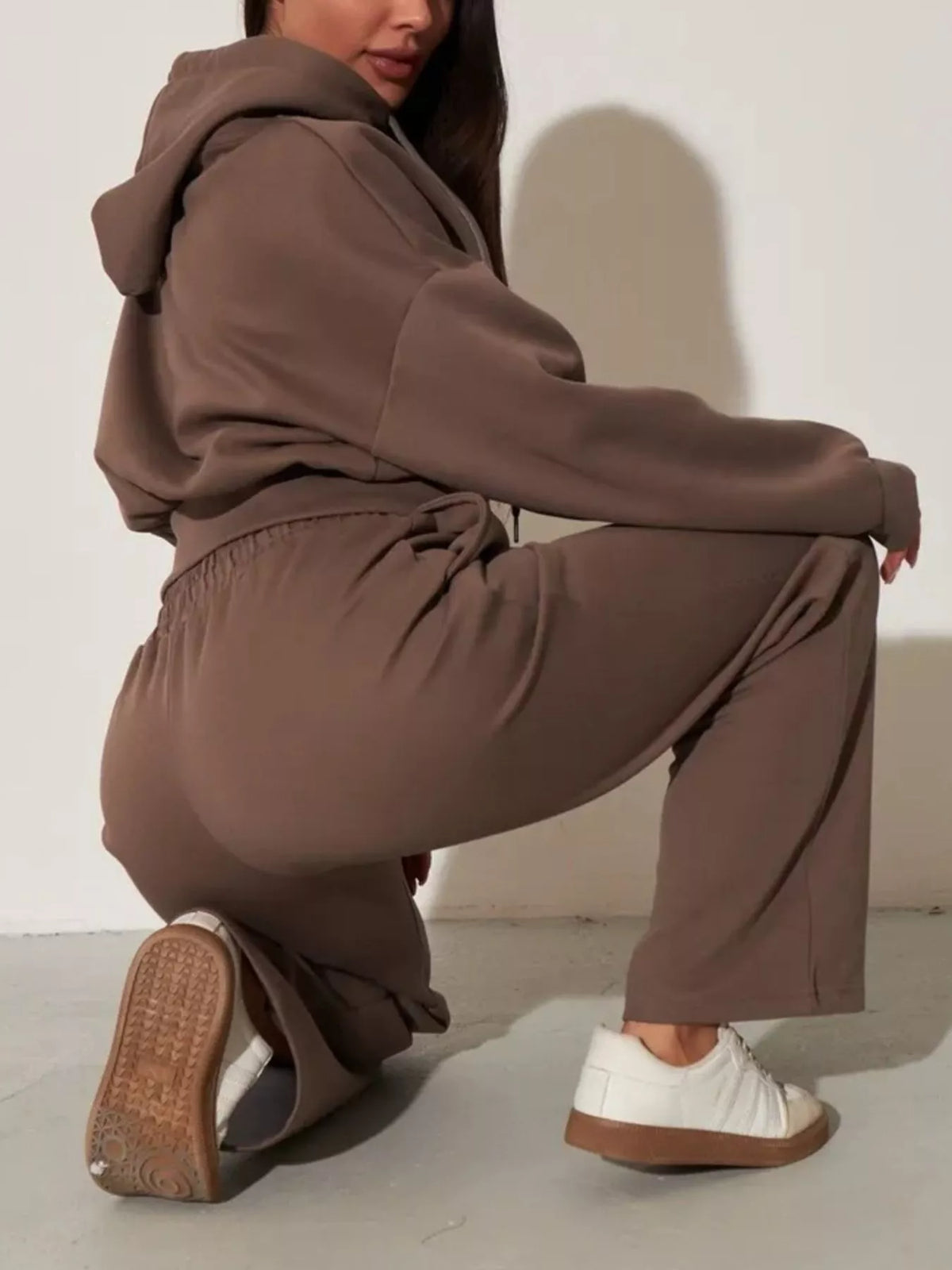 Plush Fashion Hub zip-up hoodie and wide-leg pants loungewear set, featuring a cozy design in soft, comfortable fabric.