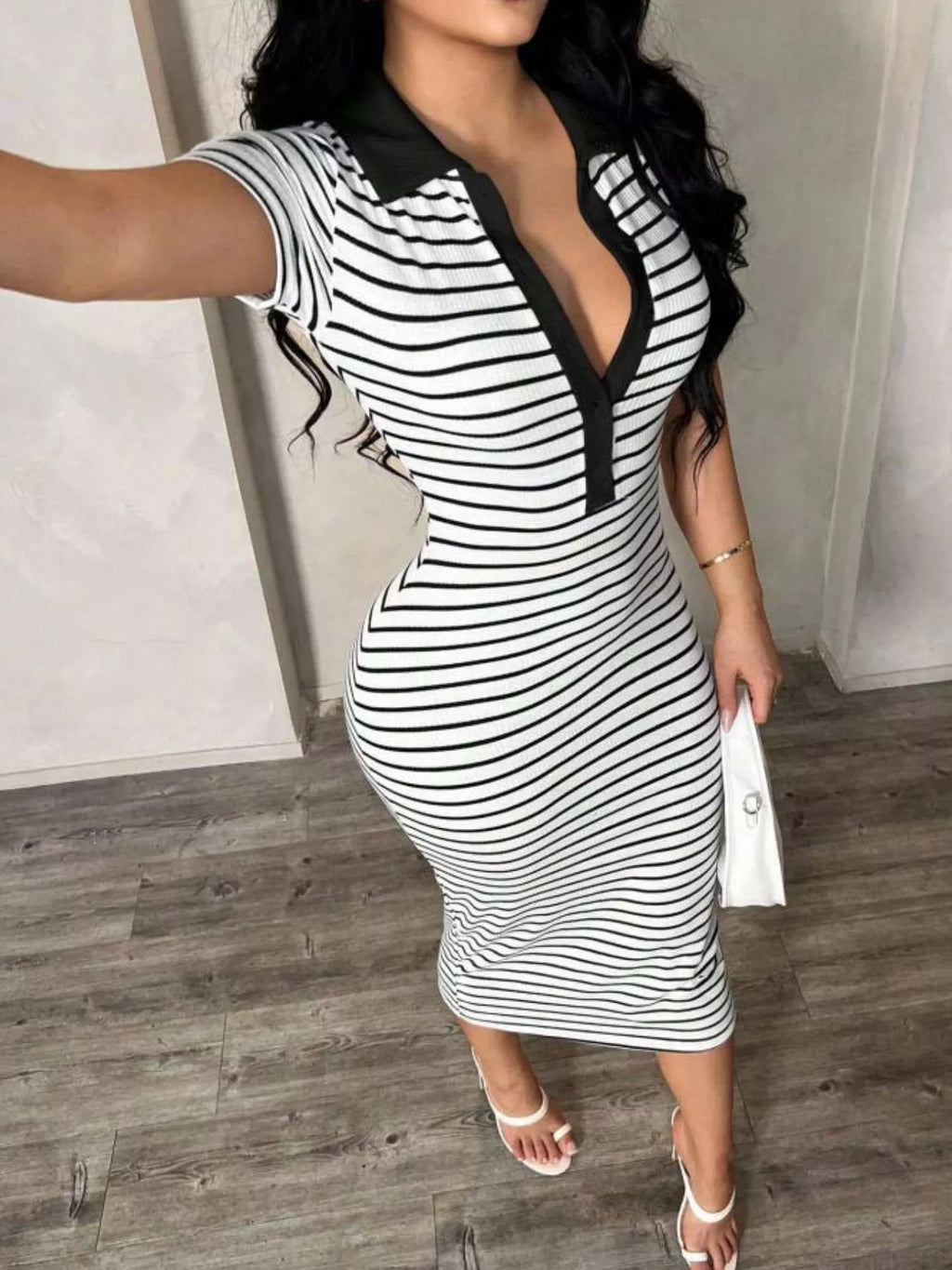 Striped polo collar midi dress by Shopimist featuring a fitted silhouette and classic design, shown on a model.