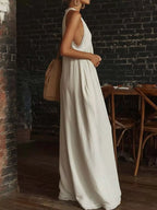 Plus size full size halter neck lace trim wide leg jumpsuit from Shopimist, featuring a stylish design and comfortable fit.