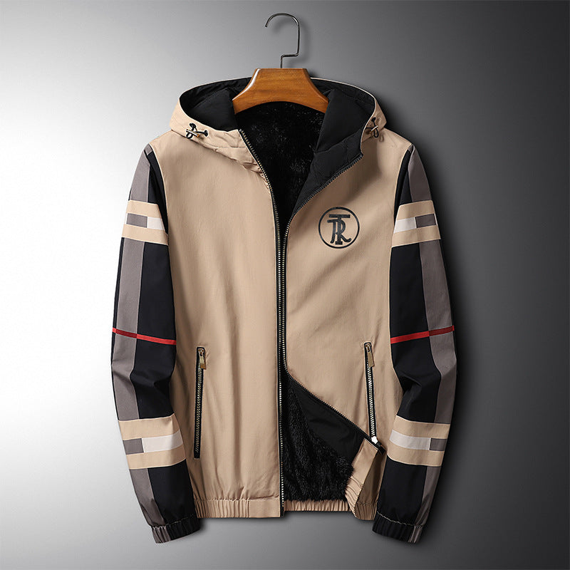 Beige, black, and grey nylon hooded jacket with plaid sleeves, faux fur lining, zipper pockets, and "TR" chest logo.