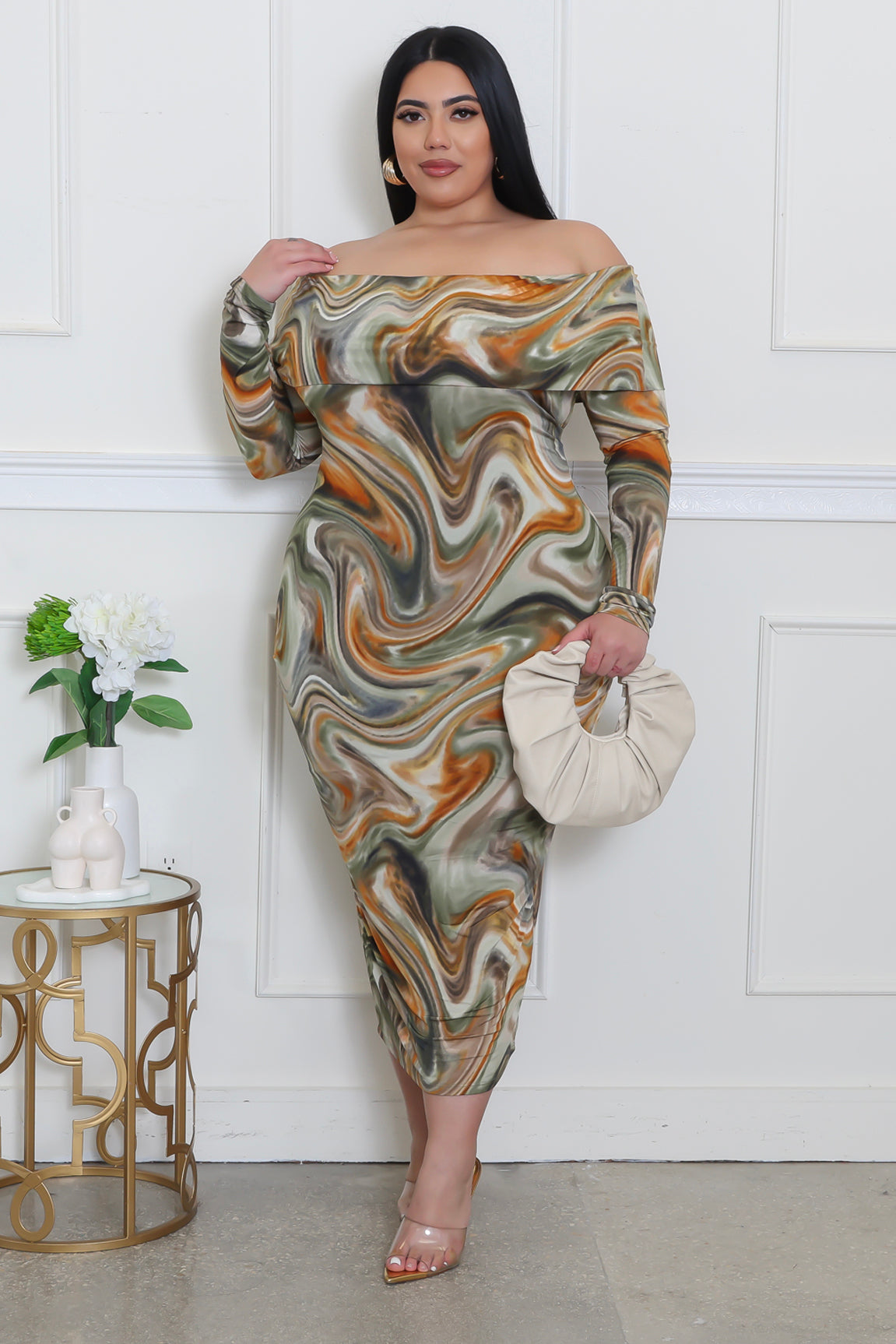 Plus size "To The Beat" dress by Fasheabe featuring a stylish, vibrant dress with a flattering fit and eye-catching design.
