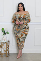 Plus size To The Beat dress by Fasheabe, featuring a stylish, colorful dress with a flowy silhouette and vibrant pattern.