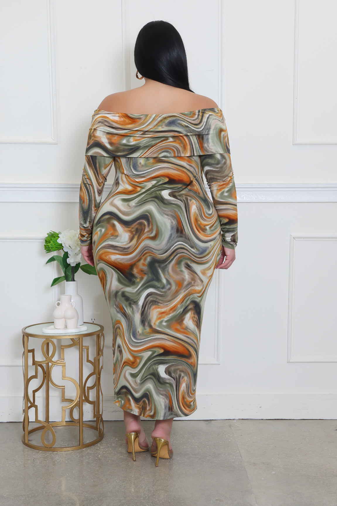 Plus size Fasheabe To The Beat dress featuring vibrant patterns and stylish design, perfect for casual or party wear.