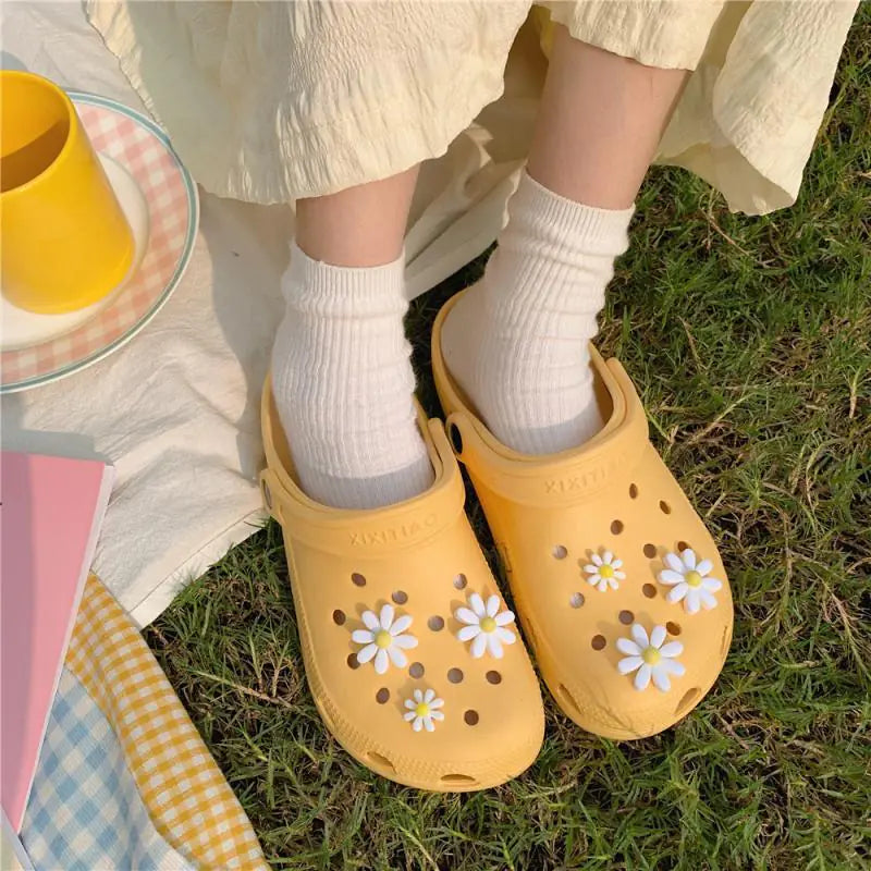 Women’s summer hole sandals by Trendy Attic Store01 featuring open-toe design and slip-on style perfect for warm weather.