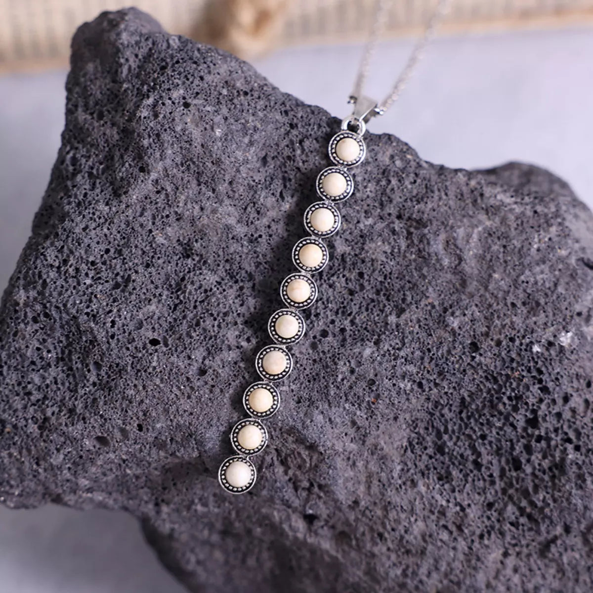 Vintage style beaded bar necklace with colorful beads, designed by Plush Fashion Hub, showcasing a trendy and elegant jewelry piece.