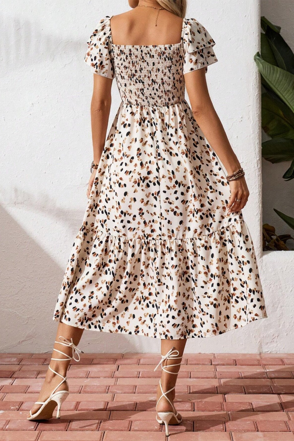 Women's square neck ruffle sleeve smocked midi dress made of cotton blend by Plush Fashion Hub, shown in a stylish, flowy design.