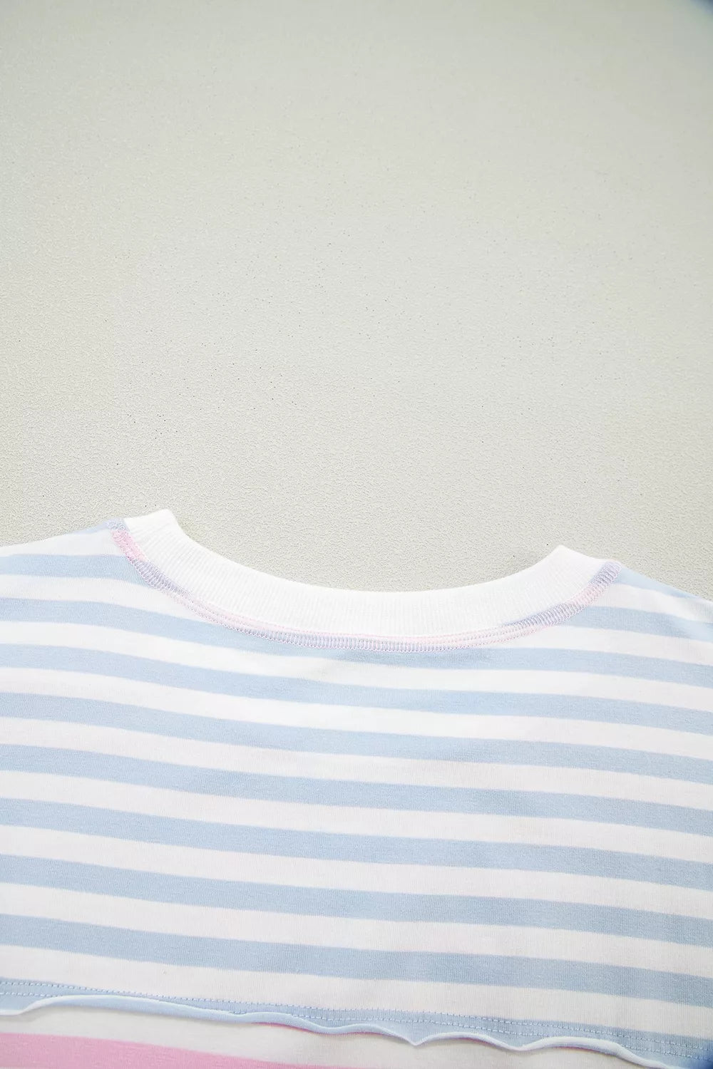 Casual striped oversized Dolman sleeve patchwork T-shirt by Plush Fashion Hub, featuring relaxed fit and colorful patchwork design.