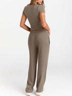 Women's round neck short sleeve T-shirt and drawstring lounge set, casual 2-piece outfit by Trendsi, shown in a relaxed fit.