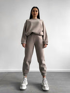 Plush Fashion Hub women's two-piece set with crewneck sweatshirt and jogger pants in a loose fit, casual and comfortable outfit.