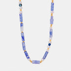 Freshwater pearl titanium steel geometric bead necklace featuring modern design and elegant jewelry style.