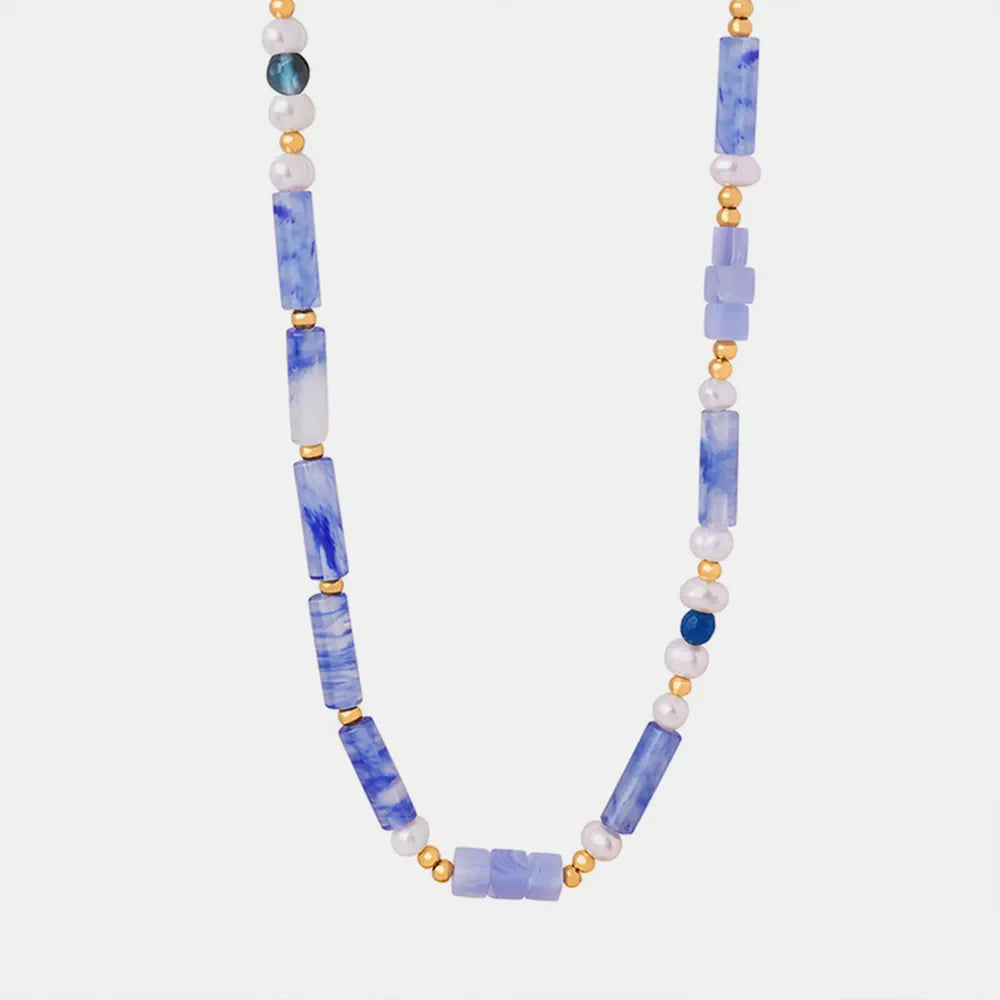 Freshwater pearl and titanium steel geometric bead necklace with modern design, featuring alternating pearl and steel beads.