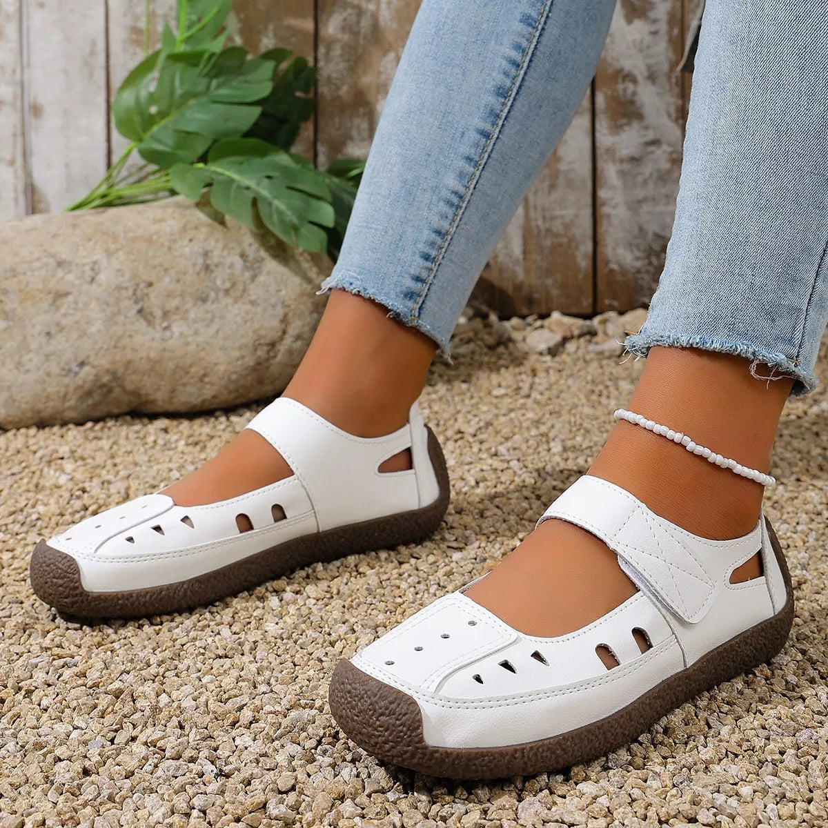 Round toe platform slip-on footwear by Trendsi featuring a sleek design and comfortable fit, perfect for casual wear.