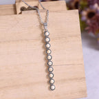 Vintage style beaded bar necklace by Shopimist featuring colorful beads on a delicate chain.