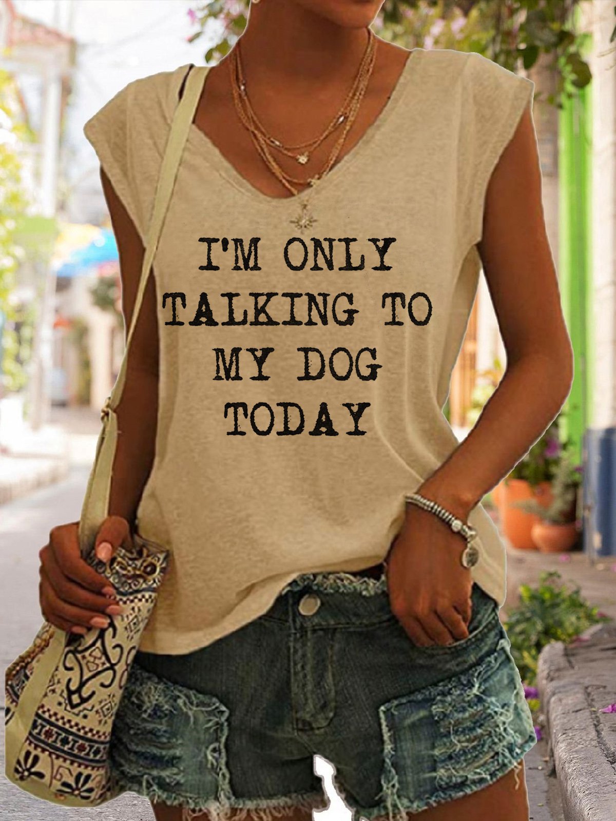 Women's V-neck printed short sleeve T-shirt from Plush Fashion Hub in various colors, loose fit and lightweight fabric.