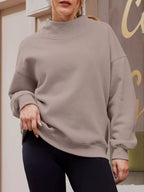 Women's oversized mock neck sweatshirt with dropped shoulders, casual fit, in soft fabric, from Trendsi.