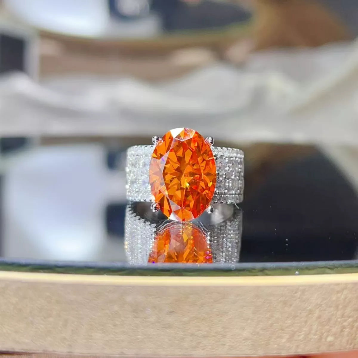 Sterling silver ring with an 8-carat moissanite gemstone, showcasing a sparkling, elegant jewelry design.