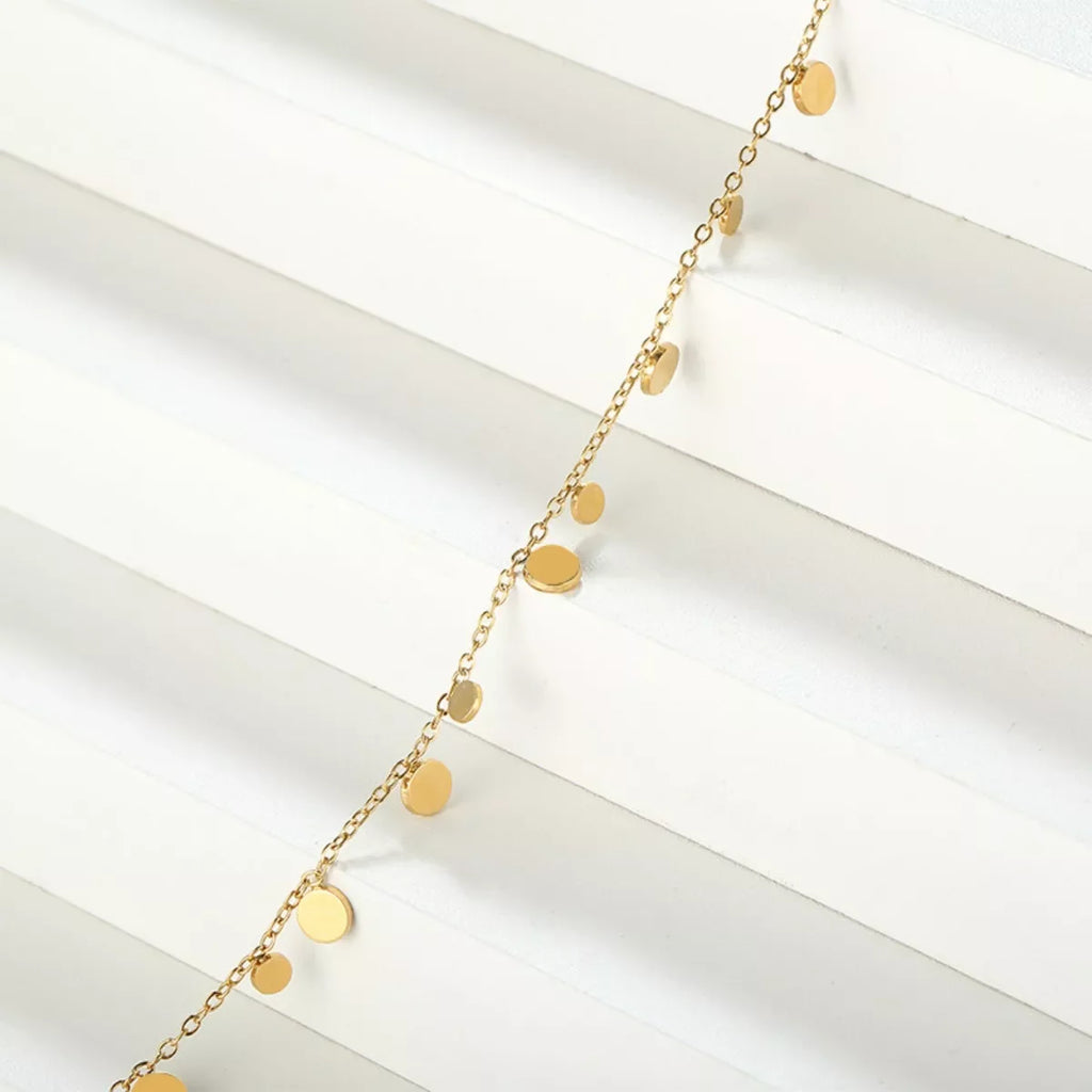 18K gold-plated charm bracelet with various decorative charms, stylish jewelry piece from Shopimist.
