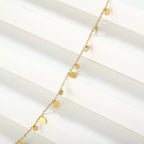 18K gold-plated charm bracelet with various decorative charms, stylish jewelry piece from Shopimist.