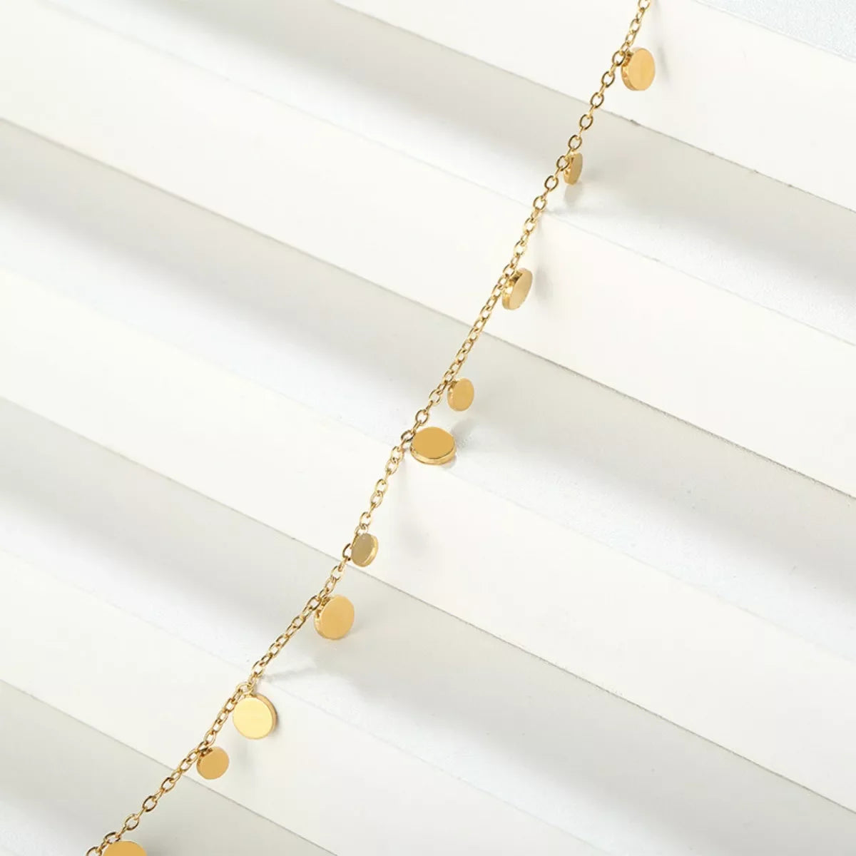 18K gold-plated charm bracelet with various decorative charms, stylish jewelry piece from Shopimist.