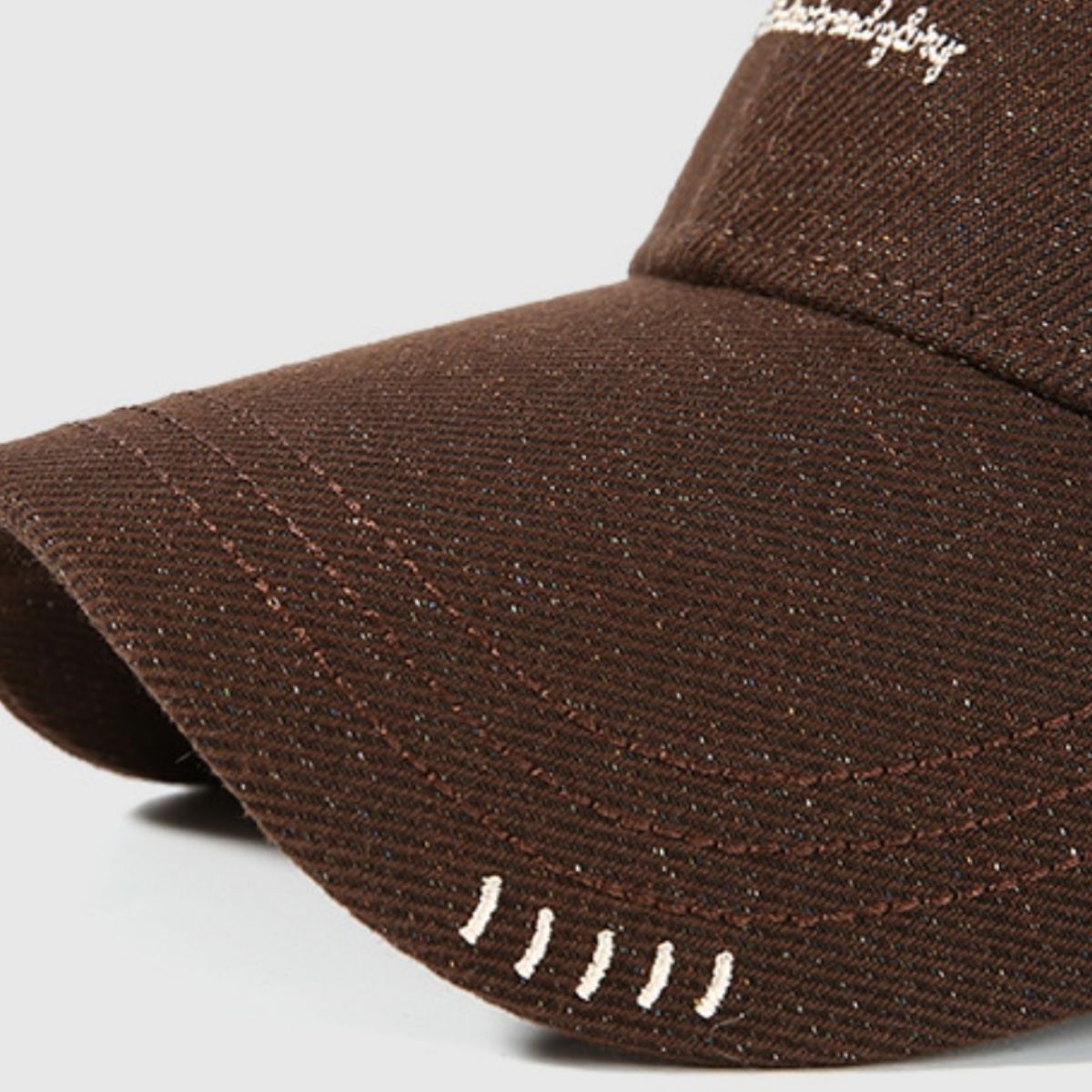 Classic embroidered cotton baseball cap by Trendsi, adjustable casualwear hat with embroidered design, perfect for everyday wear.