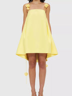 Floral strap mini A-line dress from Trendsi, featuring a fitted bodice, flared skirt, and colorful floral pattern.