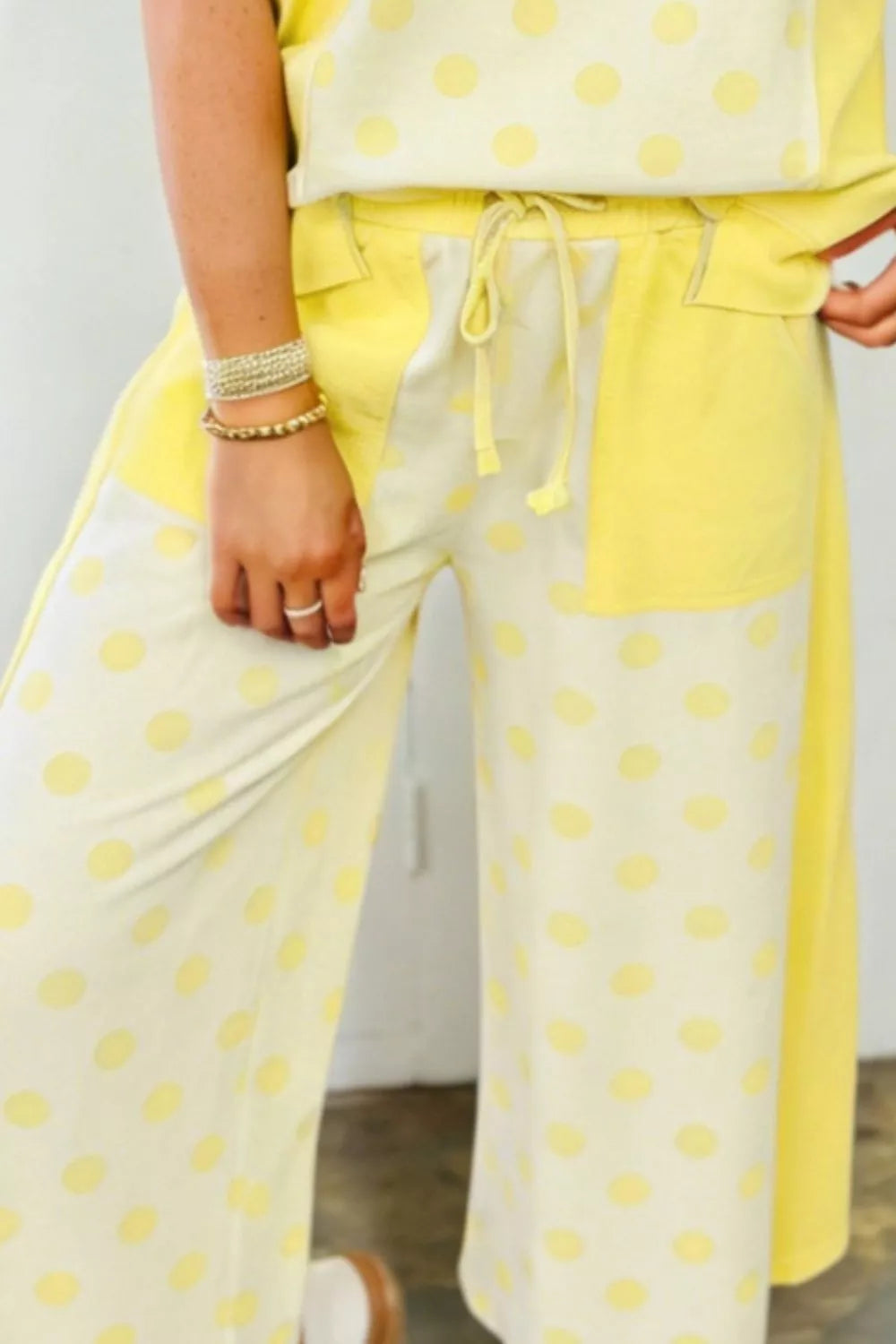 Color block patchwork polka dot top and wide-leg pant set by Shopimist, featuring vibrant patterns and comfortable fit.