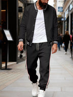 Men's plus size striped snap-down top and pants set by Trendsi, casual men's clothing with bold stripe pattern and comfortable fit.