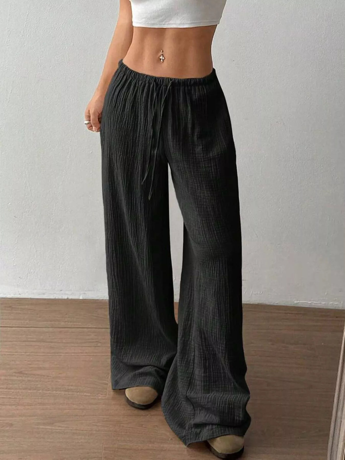 Plush Fashion Hub wide-leg drawstring pants in soft fabric, featuring a relaxed fit and casual style.