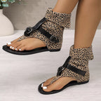 Leopard print toe post sandals by Shopimist featuring a stylish design and comfortable straps on a neutral background.