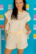 Pair of relaxed stripe tee and drawstring shorts from Trendsi, casual 2-piece outfit with rings for a comfortable, stylish look.