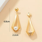 18K gold-plated pearl drop earrings with elegant dangling pearls, featuring a sleek and shiny gold finish.